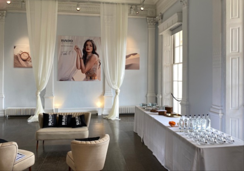 Rado posters and glasses set out